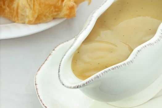 Close up of turkey gravy in a gravy boat.