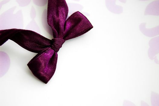 Gift card on holidays with violet bow