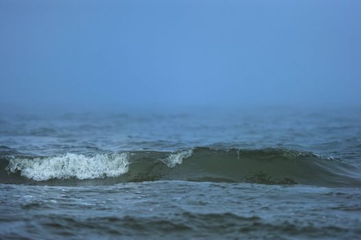 Waves on the surface of the stormy ocean