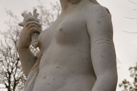 Antique statue in the visible femininity