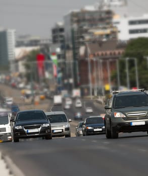 Cars passing by on an urban main road