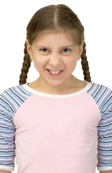 Little girl is angry on a white background
