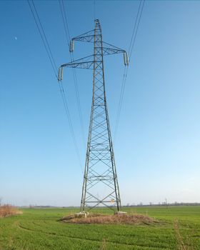 High voltage electric pillar over an agricultural field