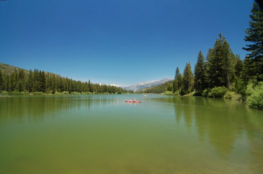Couple Boating in Hume Lake in Sequoia National Park in California USA