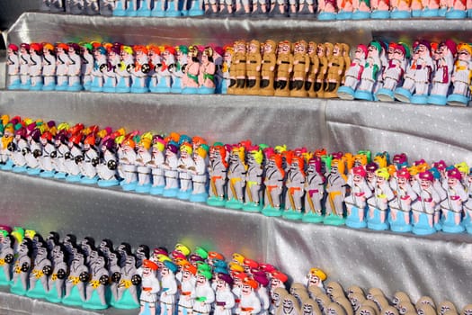 Colorful clay toys for sale in an Indian shop.
