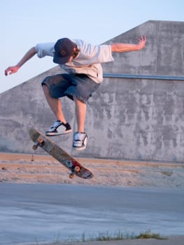 Ollie - Young skater ollieing a skateboard