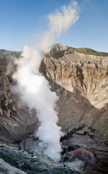 Smoking crater detail in Indonesian volcano Bromo