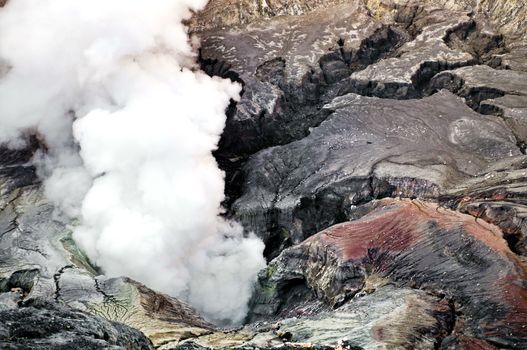 Smoking crater detail in Indonesian volcano Bromo