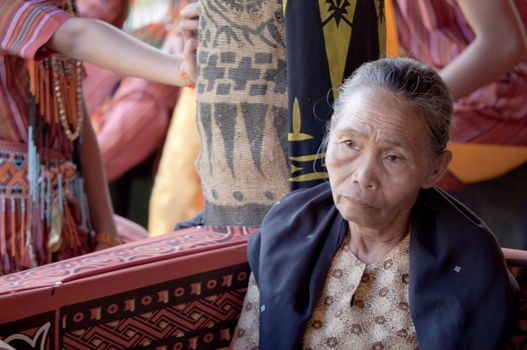 Toraja old woman sadness during a funeral ceremony in indonesia village on 15th August 2010