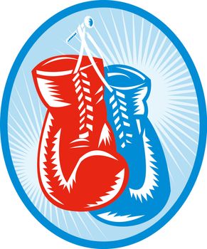 illustration of a red and blue boxing gloves with sunburst in background.