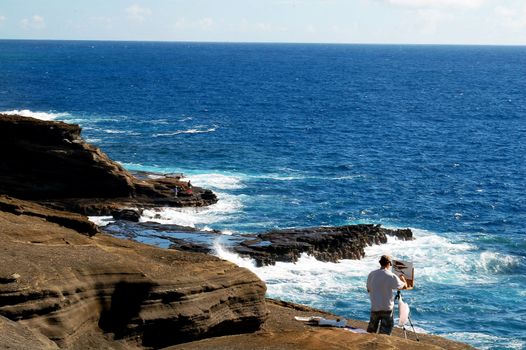 An Artist painting at Makapuu Beach Hawaii USA