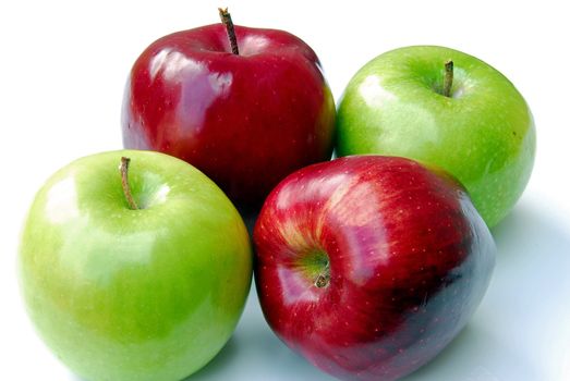 An isolated shot of red and green apples