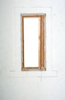 Open narrow high wooden window on white wall. Isolated with clipping path for your images