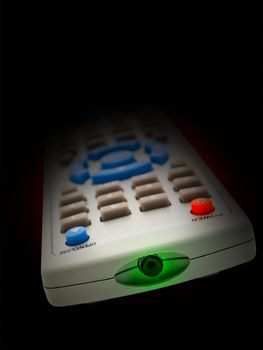 remote control over the black background