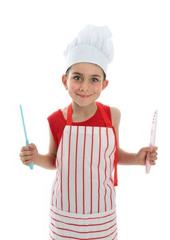 A little chef or cook holding two knives with safety covers.  White background.