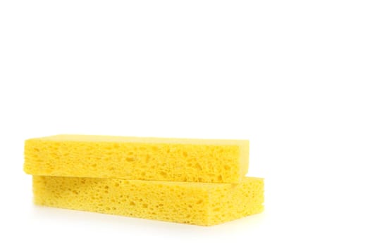 2 Yellow Sponges on White Background With Copy Space