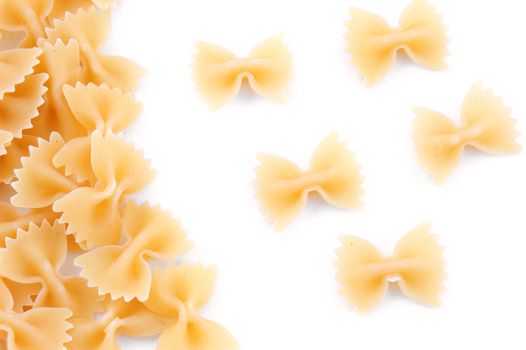 Italian pasta in bow shape on white