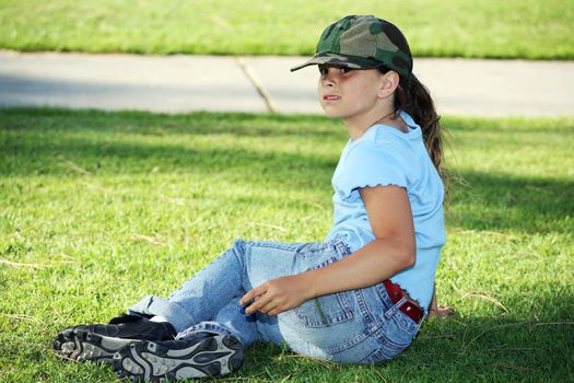 Young girl relaxing on the grass