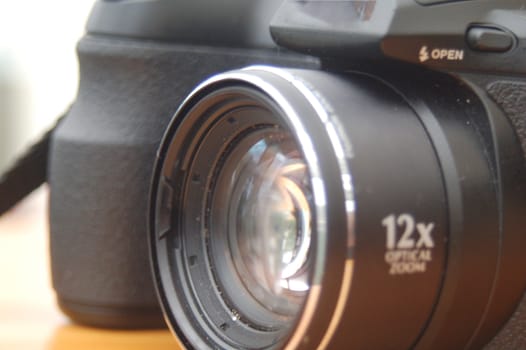 Modern Digital Bridge Camera with nice lens reflection