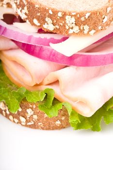 A healthy turkey sandwich on whole wheat bread