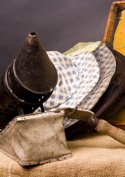 Basic attributes of every beekeeper imieszczone on a black background in studio