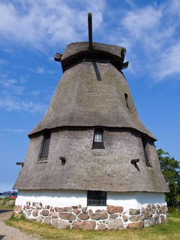 Old traditional country windmill in Funen Denmark