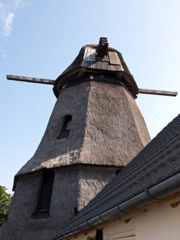 Old traditional country windmill in Funen Denmark