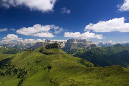 Summer portrait of Italian Dolomites in val di Fassa with Sassolungo mount