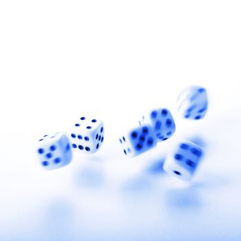 falling dice showing random fortune or casino concept