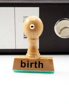 birth concept with stamp in hospital office and copyspace
