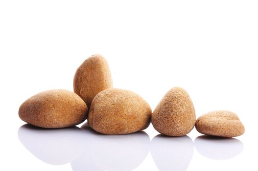 zen stones or spa still life isolated on white showing harmony with copyspace