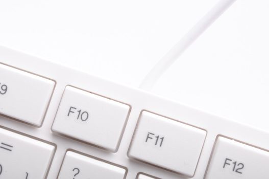 modern computer keyboard on white showing pc or technology concept