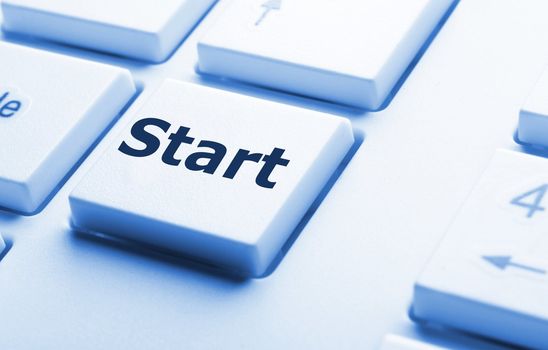 start button or key on keyboard showing go or power concept