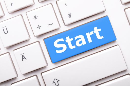 start concept with button or key showing business success concept