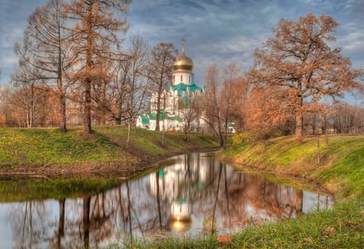 a foto of  landscape  with marshed pond in front of  the  fedorovsky cathederal in tsarskoe selo.