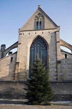 Old church with christmas tree on a cold sunny day in winter