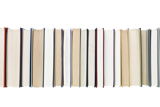 Books in a row isolated on white background