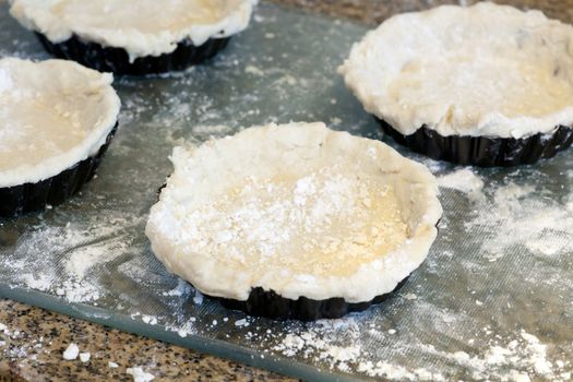 Fresh made small pastry shells.