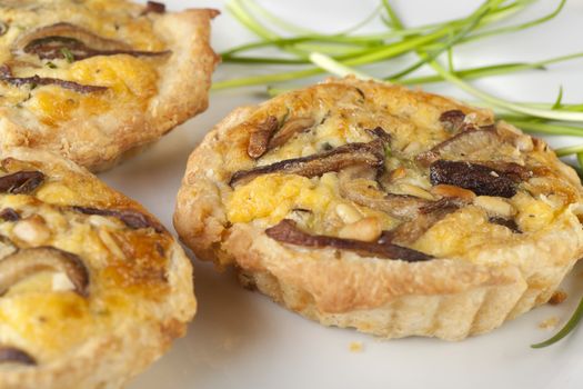 Fresh shitake mushroom quiche with fresh chives