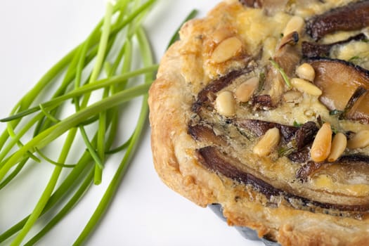 Fresh shitake mushroom quiche with fresh chives