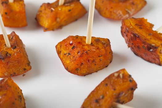Pumpkin roasted with herbs and spices and served as appetizers.