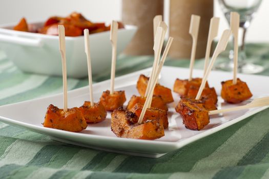 Pumpkin roasted with herbs and spices and served as appetizers.