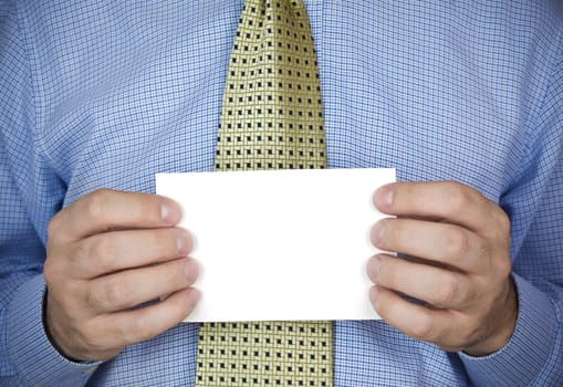 An office man holding a blank card with his hands.