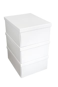 Stack of three white cardboard boxes isolated on white background.