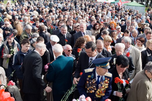 RIGA, LATVIA, MAY 9, 2008: Celebration of May 9 Victory Day (Eastern Europe) in Riga at Victory Memorial to Soviet Army