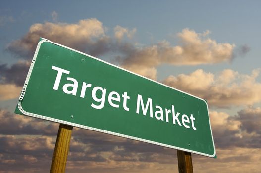 Target Market Green Road Sign with dramatic clouds and sky.