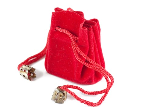 A little red bag for jewelry isolated over white