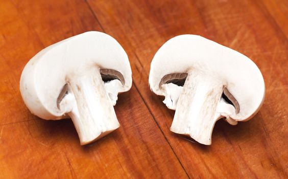 A sections of mushroom on a cutting board