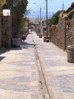 Empty, sunny street in small Latin American city