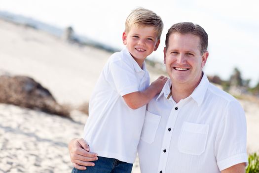 Cute Son with His Handsome Dad Portrait at The Beach.